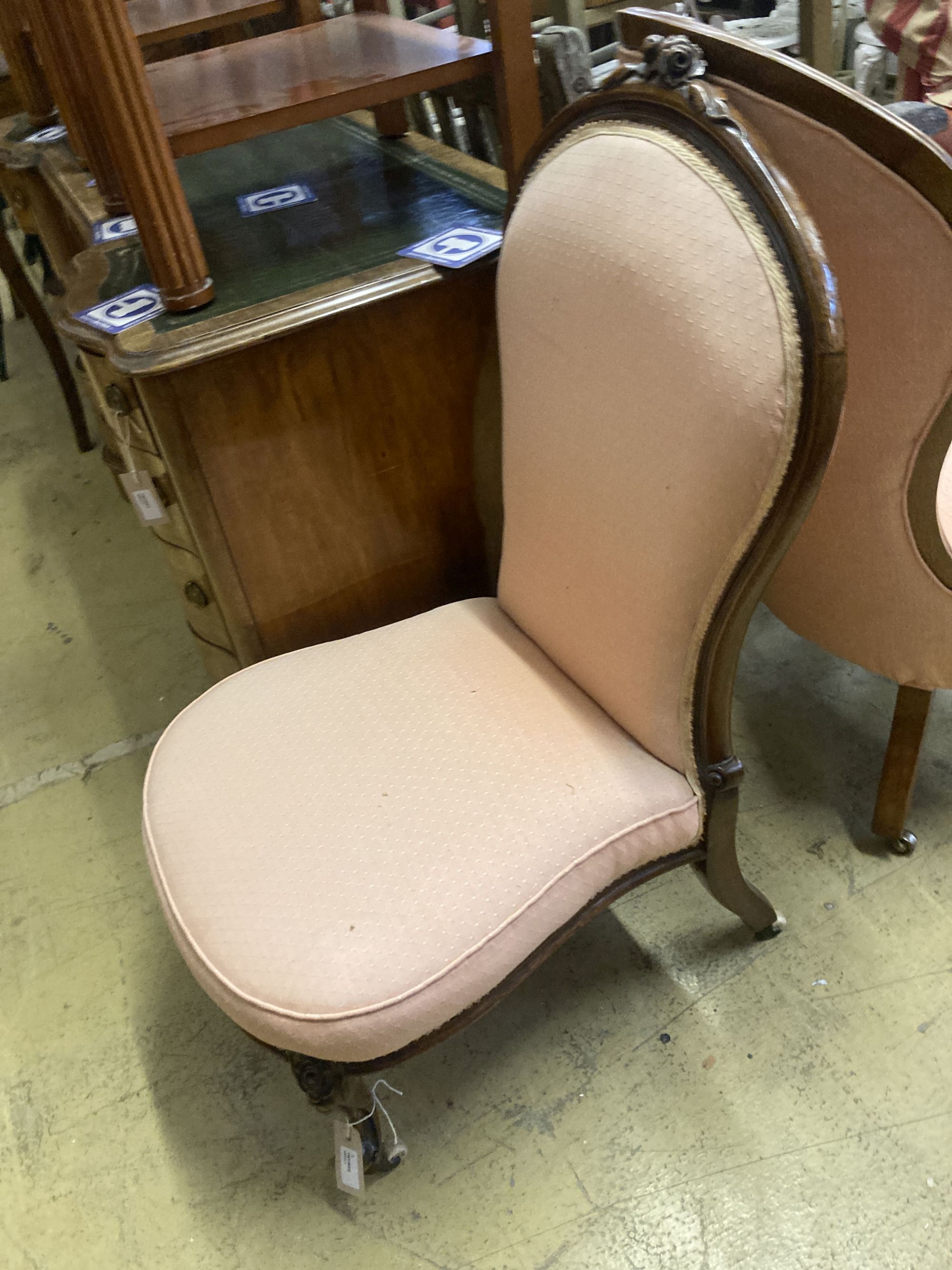 Two Victorian mahogany spoon back nursing chairs